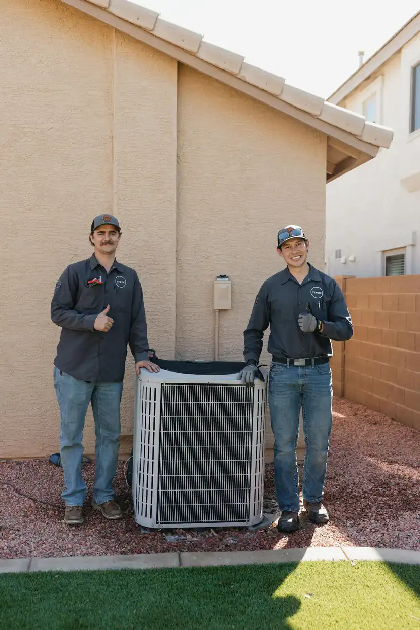 HVAC technicians working on air conditioning in Arizona